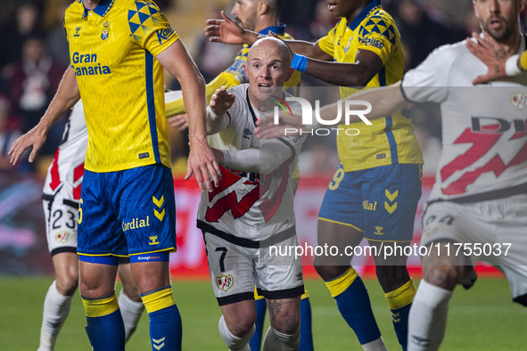 Isi Palazon of Rayo Vallecano (C) fights for the position during the La Liga EA Sports 2024/25 football match between Rayo Vallecano and UD...