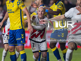 Isi Palazon of Rayo Vallecano (C) fights for the position during the La Liga EA Sports 2024/25 football match between Rayo Vallecano and UD...