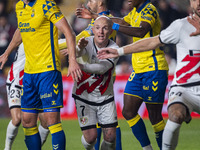 Isi Palazon of Rayo Vallecano (C) fights for the position during the La Liga EA Sports 2024/25 football match between Rayo Vallecano and UD...