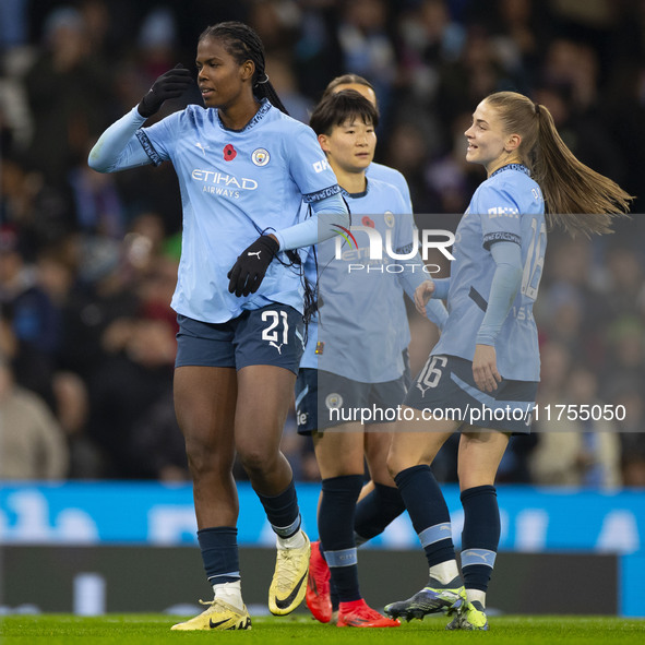 Khadija Shaw #21 of Manchester City W.F.C. celebrates her goal during the Barclays FA Women's Super League match between Manchester City and...