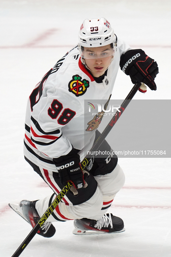 Connor Bedard #98 of the Chicago Blackhawks skates on the ice during the NHL match against the Dallas Stars at American Airlines Center in D...