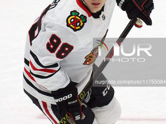 Connor Bedard #98 of the Chicago Blackhawks skates on the ice during the NHL match against the Dallas Stars at American Airlines Center in D...