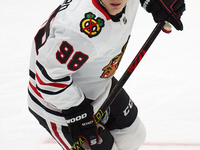 Connor Bedard #98 of the Chicago Blackhawks skates on the ice during the NHL match against the Dallas Stars at American Airlines Center in D...