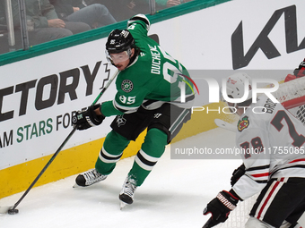 Matt Duchene #95 of the Dallas Stars skates on the ice while controlling the puck during the NHL match against the Chicago Blackhawks at Ame...