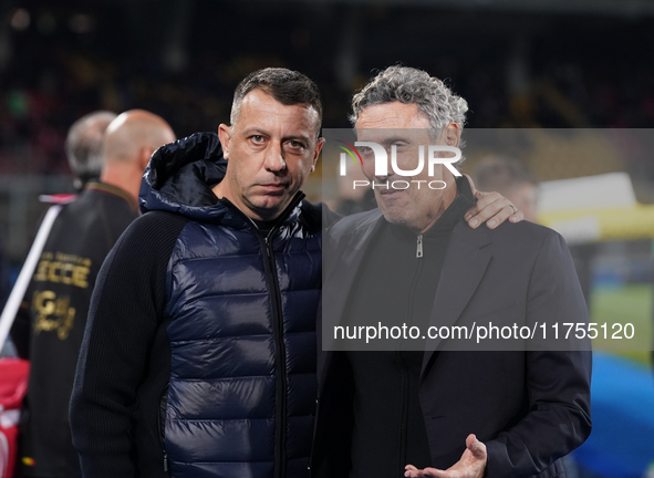 Luca Gotti, head coach of US Lecce, is with Roberto D'Aversa, head coach of Empoli FC, during the Serie A match between US Lecce and Empoli...