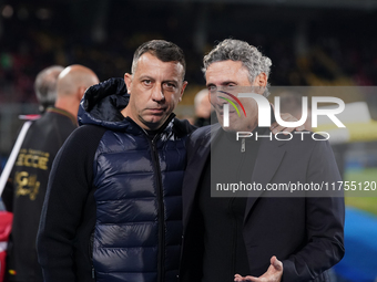 Luca Gotti, head coach of US Lecce, is with Roberto D'Aversa, head coach of Empoli FC, during the Serie A match between US Lecce and Empoli...