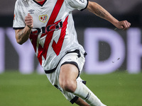 Sergio Camello of Rayo Vallecano is in action with the ball during the La Liga EA Sports 2024/25 football match between Rayo Vallecano and U...