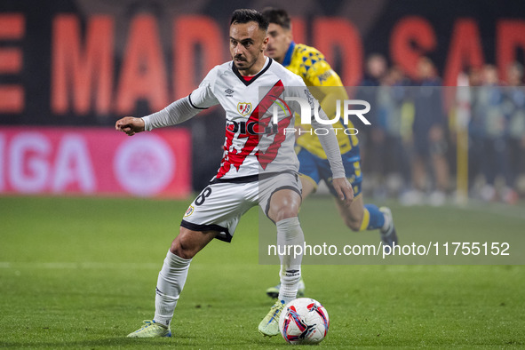 Alvaro Garcia of Rayo Vallecano is in action with the ball during the La Liga EA Sports 2024/25 football match between Rayo Vallecano and UD...