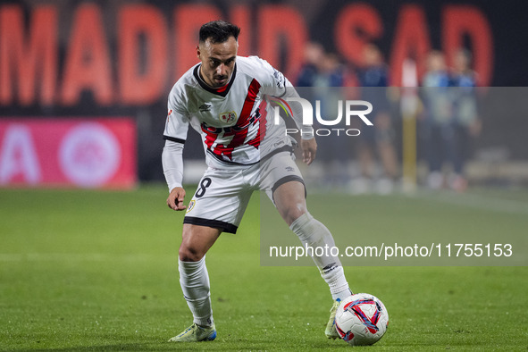 Alvaro Garcia of Rayo Vallecano is in action with the ball during the La Liga EA Sports 2024/25 football match between Rayo Vallecano and UD...