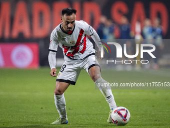 Alvaro Garcia of Rayo Vallecano is in action with the ball during the La Liga EA Sports 2024/25 football match between Rayo Vallecano and UD...