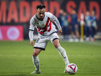 Alvaro Garcia of Rayo Vallecano is in action with the ball during the La Liga EA Sports 2024/25 football match between Rayo Vallecano and UD...