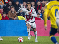 Oscar Trejo of Rayo Vallecano is in action with the ball during the La Liga EA Sports 2024/25 football match between Rayo Vallecano and UD L...