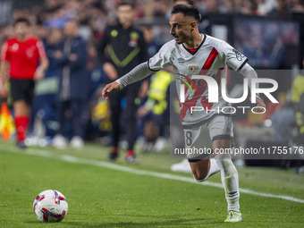 Alvaro Garcia of Rayo Vallecano is in action with the ball during the La Liga EA Sports 2024/25 football match between Rayo Vallecano and UD...