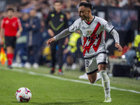 Alvaro Garcia of Rayo Vallecano is in action with the ball during the La Liga EA Sports 2024/25 football match between Rayo Vallecano and UD...