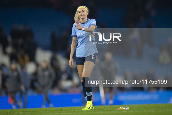 Chloe Kelly #9 of Manchester City W.F.C. salutes the fans at full-time during the Barclays FA Women's Super League match between Manchester...