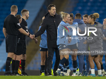 Manchester City W.F.C. manager Gareth Taylor shakes hands with officials at full time during the Barclays FA Women's Super League match betw...