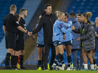 Manchester City W.F.C. manager Gareth Taylor shakes hands with officials at full time during the Barclays FA Women's Super League match betw...