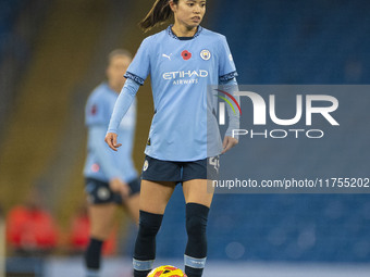 Yui Hasegawa, number 25 of Manchester City W.F.C., is in action during the Barclays FA Women's Super League match between Manchester City an...