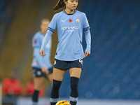 Yui Hasegawa, number 25 of Manchester City W.F.C., is in action during the Barclays FA Women's Super League match between Manchester City an...