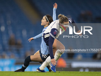 Yui Hasegawa #25 of Manchester City W.F.C. is fouled by the opponent during the Barclays FA Women's Super League match between Manchester Ci...