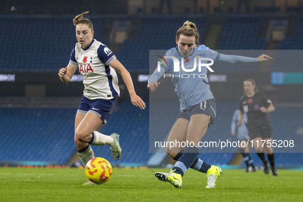 Lauren Hemp #11 of Manchester City W.F.C. crosses the ball during the Barclays FA Women's Super League match between Manchester City and Tot...