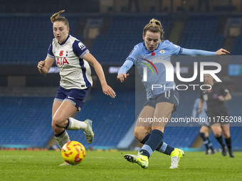 Lauren Hemp #11 of Manchester City W.F.C. crosses the ball during the Barclays FA Women's Super League match between Manchester City and Tot...