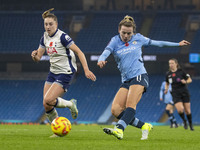 Lauren Hemp #11 of Manchester City W.F.C. crosses the ball during the Barclays FA Women's Super League match between Manchester City and Tot...