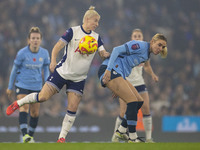 Jill Roord #10 of Manchester City W.F.C. challenges an opponent during the Barclays FA Women's Super League match between Manchester City an...