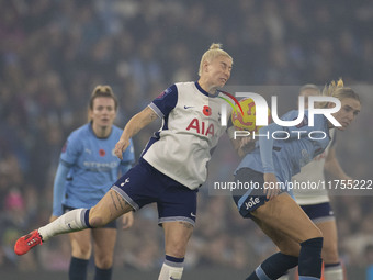 Jill Roord #10 of Manchester City W.F.C. challenges an opponent during the Barclays FA Women's Super League match between Manchester City an...