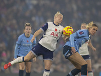 Jill Roord #10 of Manchester City W.F.C. challenges an opponent during the Barclays FA Women's Super League match between Manchester City an...