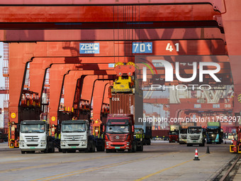 Container operations take place at the Qianwan Container terminal of Qingdao Port in Qingdao, China, on November 8, 2024. (