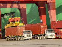 Container operations take place at the Qianwan Container terminal of Qingdao Port in Qingdao, China, on November 8, 2024. (