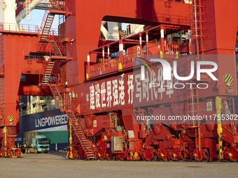 Container operations take place at the Qianwan Container terminal of Qingdao Port in Qingdao, China, on November 8, 2024. (