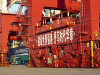 Container operations take place at the Qianwan Container terminal of Qingdao Port in Qingdao, China, on November 8, 2024. (