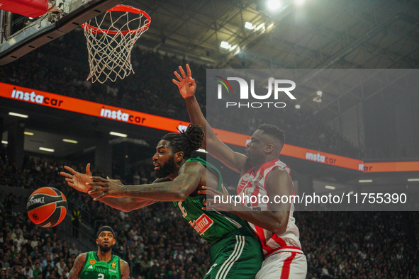 Mathias Lessort and Moustapha Fall are in an action moment during the Euroleague game between Panathinaikos and Olympiacos, with a final sco...