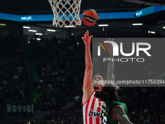 Nikola Milutinov and Mathias Lessort are in action during the Euroleague game between Panathinaikos and Olympiacos, with a final score of 89...