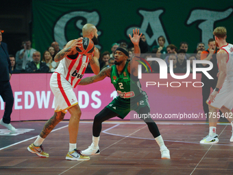 Evan Fournier and Lorenzo Brown are in an action moment during the Euroleague game between Panathinaikos and Olympiacos, with a final score...