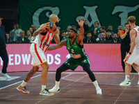 Evan Fournier and Lorenzo Brown are in an action moment during the Euroleague game between Panathinaikos and Olympiacos, with a final score...