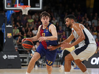 Juan Nunez and Timothe Luwawu-Cabarrot play during the match between FC Barcelona and Baskonia Vitoria-Gasteiz, corresponding to week 8 of t...