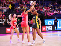 Kamogelo Maseko of South Africa and Zara Everitt of England compete for the ball during the Fast5 Netball World Series match between England...