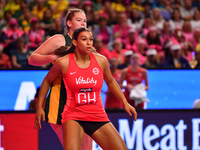 Jayda Pechova of England and Rolene Streutker of South Africa compete during the Fast5 Netball World Series match between England and South...