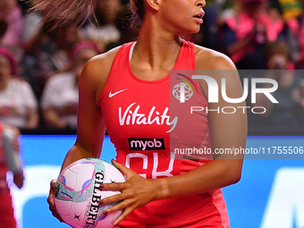 Jayda Pechova of England controls the ball during the Fast5 Netball World Series match between England and South Africa at the Wolfbrook Are...