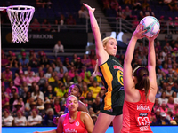 Sanmarie Visser of South Africa attempts to catch the ball as Harriet Jones of England shoots during the Fast5 Netball World Series match be...