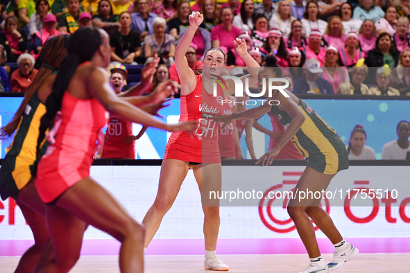 Harriet Jones of England competes during the Fast5 Netball World Series match between England and South Africa at the Wolfbrook Arena in Chr...