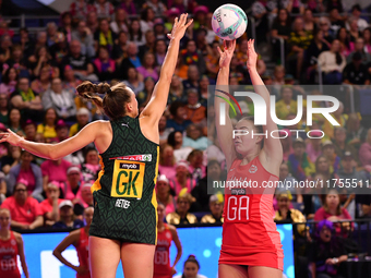 Ane Retief of South Africa competes for the ball as Harriet Jones of England shoots during the Fast5 Netball World Series match between Engl...