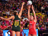 Ane Retief of South Africa competes for the ball as Harriet Jones of England shoots during the Fast5 Netball World Series match between Engl...