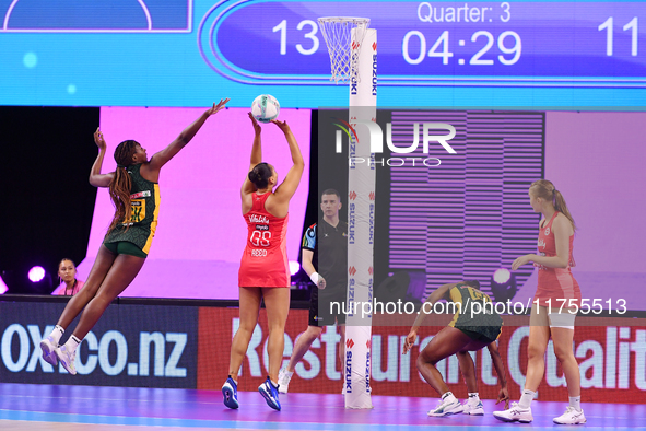 Paige Reed of England (C) shoots during the Fast5 Netball World Series match between England and South Africa at the Wolfbrook Arena in Chri...