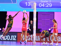 Paige Reed of England (C) shoots during the Fast5 Netball World Series match between England and South Africa at the Wolfbrook Arena in Chri...