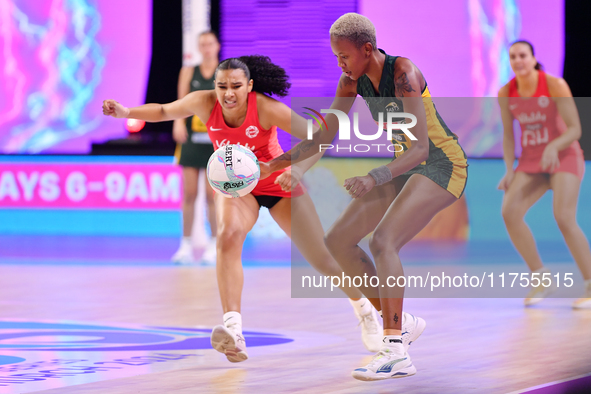 Kamogelo Maseko of South Africa and Isabella Philips of England compete for the ball during the Fast5 Netball World Series match between Eng...