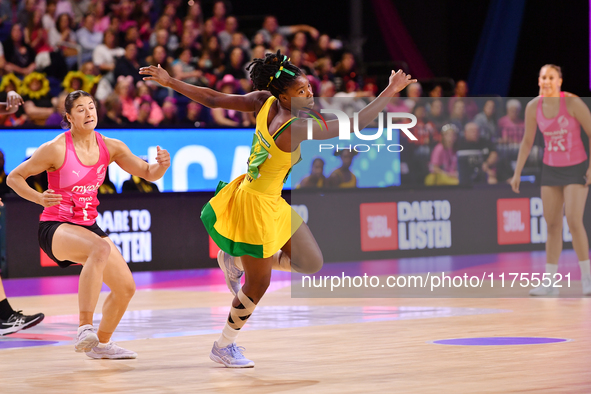 Zaudi Green of Jamaica (C) competes in the Fast5 Netball World Series match between New Zealand and Jamaica at the Wolfbrook Arena in Christ...